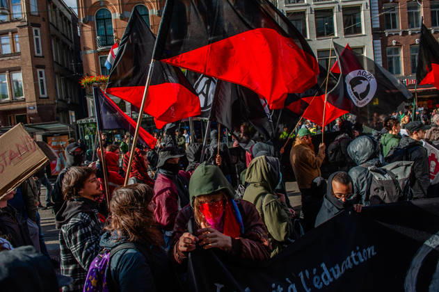 October 10, 2026, Amsterdam, North Holland, Netherlands: A group of anarchists is marching with their faces covered during the demonstration. People gathered against the worsening housing crisis. Under the motto Houses for people, not for profit, they demand fundamental changes in Dutch public housing. Amsterdam Netherlands  - ZUMAs197 20261010_aaa_s197_551 Copyright: xAnaxFernandezx
