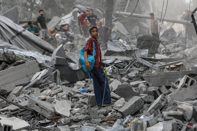 Israeli attack on Az-Zawayda area in Gaza DEIR AL-BALAH, GAZA, PALESTINE - OCTOBER 11: A Palestinian girl stands amid the rubble of destroyed buildings following an Israeli airstrike targeting a building belonging to the Buheysi family in the town of Az-Zawayda, near Deir al-Balah in the central Gaza Strip, on October 11, 2026. Israeli forces carried out the strike despite the ceasefire, destroying the targeted building and damaging surrounding structures. Adam Bilal Anadolu Deir Al-Balah Gaza. Editorial use only. Please get in touch for any other usage. Copyright: x2026xAnadoluxAdamxBilalx