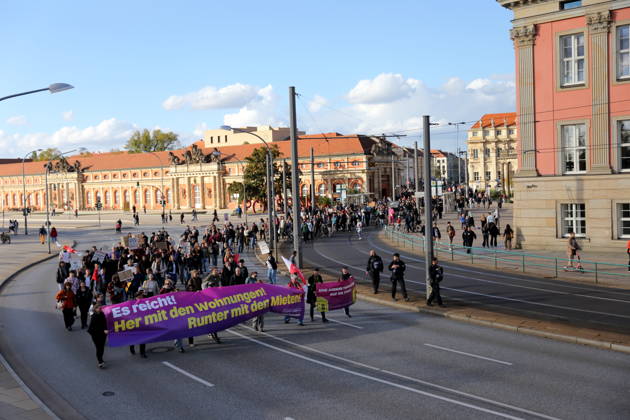 Protesters march with a banner reading Enough Is Enough—Give Us Apartments, Lower Rents in front of the state parliament during a demonstration against the housing crisis and rising rents, Potsdam, October 10, 2026. Rent Protest in Potsdam