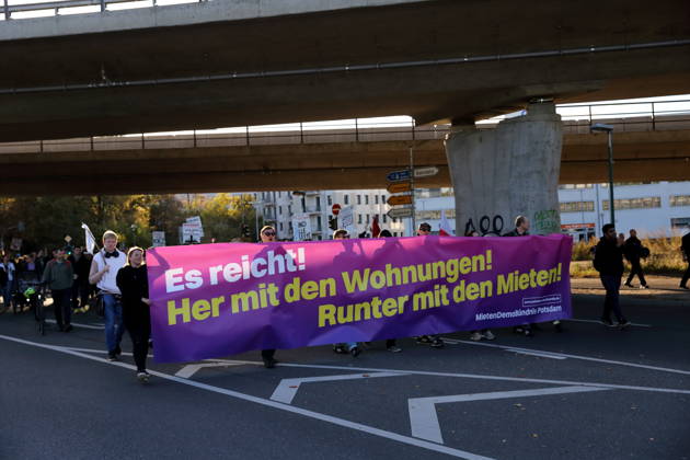 Protesters march down Friedrich List Street carrying a banner that reads Enough is enough! Give us housing! Lower the rents! during a demonstration against the housing crisis and rising rents, Potsdam, October 10, 2026. Rent Protest in Potsdam