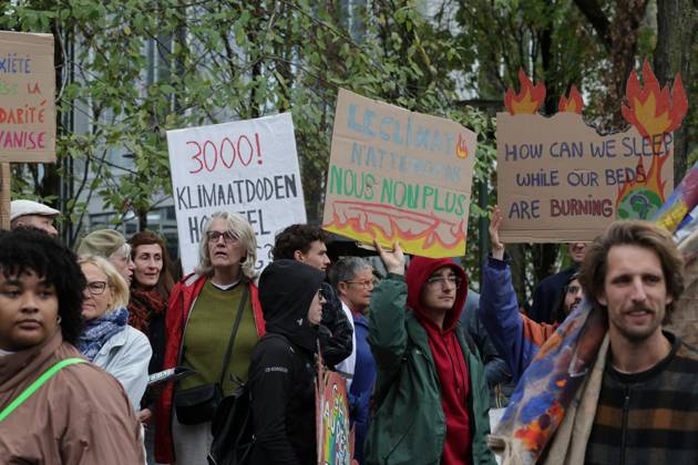 This image shows the Climate March 2026, organized by the Climate Coalition, in Brussels, on Sunday 11 October 2026. The Climate Coalition demands the federal and regional governments to stop subsidizing polluting industrial activities in Belgium and levy higher taxes on these companies. NICOLASxMAETERLINCK 189444499