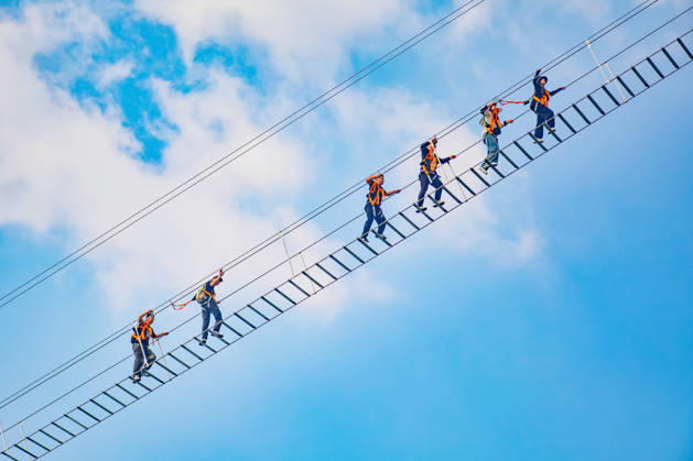China Sky Ladder Challenger Tourists climb up a 250-meter-long soft ladder between two mountains in Mingtangshan Scenic Area in Yuexi county in central China s Anhui province, Sunday, Oct. 11, 2026. The rope ladder has 620 steps and a vertical distance of 365 meters. It opened to tourists in June this year, and quickly became a tourist attraction., Credit:stringer Utuku Feature China Avalon CHINA, ANHUI, YUEXI Copyright: xstringerx xUtuku FeaturexChinax xAvalonx 1142342703