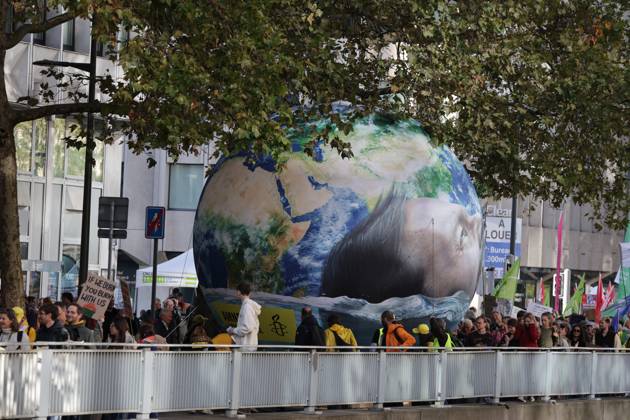 This image shows the Climate March 2026, organized by the Climate Coalition, in Brussels, on Sunday 11 October 2026. The Climate Coalition demands the federal and regional governments to stop subsidizing polluting industrial activities in Belgium and levy higher taxes on these companies. NICOLASxMAETERLINCK 189457630