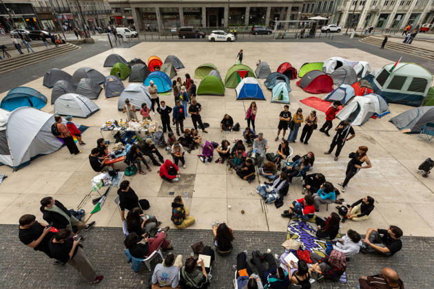October 11, 2026, Porto, Portugal: Protesters seen inside a temporary encampment established in Praca D. Joao I by the Nao Da Mais Para Viver Assim movement following demonstrations against housing affordability and the rising cost of living. Porto Portugal  - ZUMAs197 20261011_aaa_s197_041 Copyright: xDiogoxBaptistax