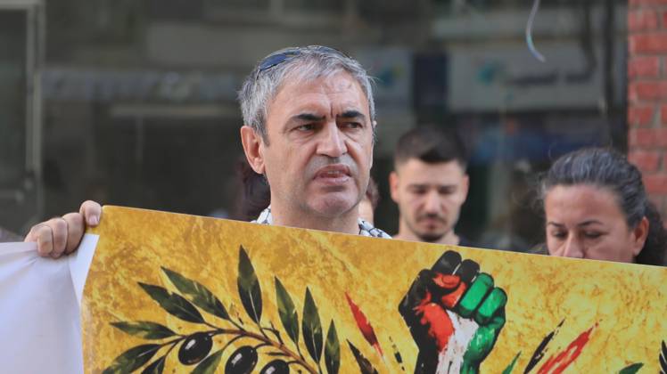 October 11, 2026, Â°Zmir, ToÂ¼rkiye: IZMIR, TURKEY, OCTOBER 11, 2026: Pro-Palestinian demonstrators gather outside the Turkan Saylan Cultural Center in Izmir during a protest organized by the local branch of the Association for the Freedom of Palestinians. Participants condemn Israeli military operations in Gaza and criticize US support for Israel, calling attention to Palestinian civilian casualties since October 7, 2023. The demonstration concludes at Gundogdu Square, where participants throw carnations into the sea in remembrance of Palestinians killed during the conflict. Â°Zmir Türkiye - ZUMAq101 20261011_zna_q101_107 Copyright: xTurgayxKilicx