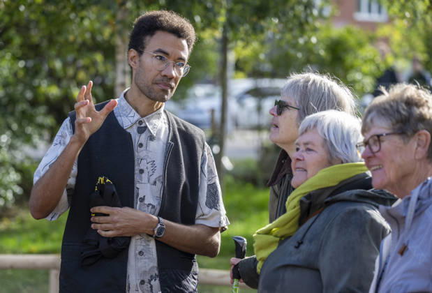 MALMÖ, October 11, 2026—Santiago Mostyn spoke with visitors as the Master Narratives monument was unveiled on Sunday in Jesusparken in Malmö. Malmö’s anti-racism monument, titled Master Narratives, was created by artists Susanna Marcus Jablonski and Santiago Mostyn and consists of 168 bronze rods that lift a boulder weighing nearly 30 metric tons. MALMÖ, SWEDE  Copyright: xJohanxNilssonx xTTx INVIGNING MASTER NARRATIVES - MALMÖS ANTIRASISTISKA MONUMENT idye8MLA3xA