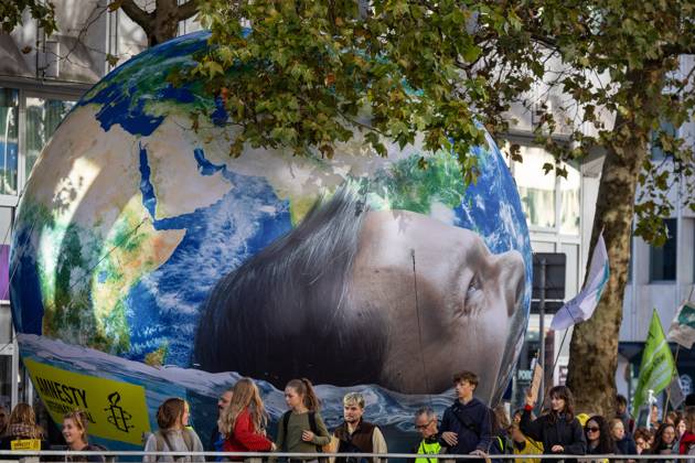 This image shows the Climate March 2026, organized by the Climate Coalition, in Brussels, on Sunday 11 October 2026. The Climate Coalition demands the federal and regional governments to stop subsidizing polluting industrial activities in Belgium and levy higher taxes on these companies. NICOLASxMAETERLINCK 189472082