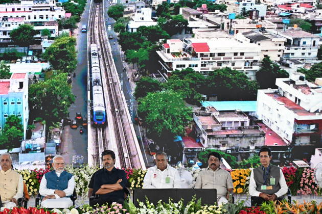 Indian Politics CHENNAI METRO PHASE-II INAUGURATION & JOINT RIDE CHENNAI, TAMIL NADU: Prime Minister Narendra Modi alongside Tamil Nadu Chief Minister C. Joseph Vijay waves to the gathering during the flagging-off ceremony of the Phase II network of the Chennai Metro Rail Project at the Porur Bypass Metro Rail Station on Sunday, October 11, 2026. PM Modi and CM Vijay subsequently undertook a joint metro ride from Porur Bypass Station to Poonamallee Bypass Station and back, marking the official opening of the ₹4,900-crore, 14.6-km Poonamallee Vadapalani elevated stretch. The high-profile event marked the first joint public appearance of the two leaders following Vijay s recent victory in the Tamil Nadu Assembly elections. Chennai INDIA Copyright: xSeshadrixSukumarx
