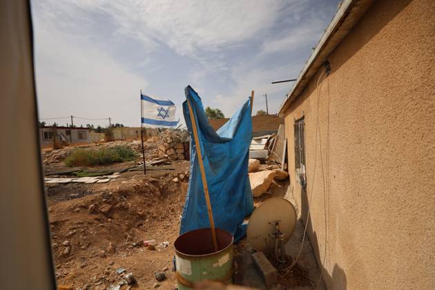 Settlers restrict access to Palestinian property UMM AL-KHAIR, MASAFER YATTA, OCCUPIED WEST BANK, OCTOBER 11, 2026: Israeli settlers placed barbed wire in the sheep pen yard and plastic sheets in front of the windows of the Salem al-Hathaleen family home in Umm al-Khair, Masafer Yatta, south of Hebron. The Israeli military subsequently declared the area a closed military zone, preventing the family from accessing the sheep pen and backyard, where a newly established settler outpost is located. MASAFER YATTA Palestine, State of Copyright: x xMosabxshawerx xJNAxPressx