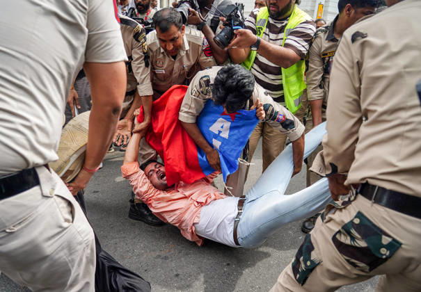 Protester being detained during their protest against CEC Gyanesh Kumar in New Delhi New Delhi, Oct 11 (ANI): A protester being detained during their protest against Chief Election Commissioner Gyanesh Kumar at Palika Bazar, Connaught Place, in New Delhi on Sunday. NEW DELHI Delhi India Copyright: xANIx ANI_20261011128