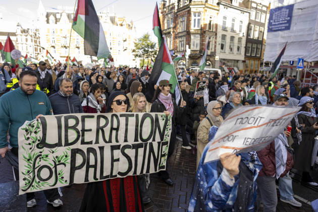 October 11, 2026, Amsterdam, Noord-Holland, The Netherlands: October 11, 2026, Amsterdam, Netherlands: Demonstrators carry a banner reading Liberation for Palestine during a pro-Palestinian march through central Amsterdam. Amsterdam The Netherlands - ZUMAl165 20261011_zip_l165_016 Copyright: xOrinxLouisx