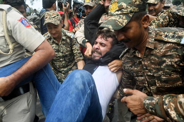 Workers of SFI, AISF and AIYF are being detained by Delhi Police while holding a protest against CEC Gyanesh Kumar at the Inner Circle of Connaught Place New Delhi, Oct 11 (ANI): Workers of SFI, AISF and AIYF are being detained by Delhi Police while holding a protest against CEC Gyanesh Kumar at the Inner Circle of Connaught Place, in New Delhi on Sunday. Delhi New Delhi India Copyright: xANIx ANI_20261011465