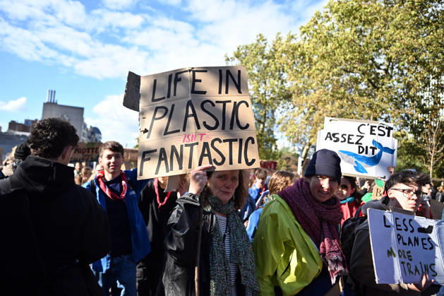Tens of thousands march in Brussels demanding stronger climate action BRUSSELS, BELGIUM - OCTOBER 11: Demonstrators hold climate-themed placards as tens of thousands of people march through Brussels calling for stronger action against climate change and reduced dependence on fossil fuels, on October 11, 2026 in Brussels, Belgium. The protest was organized by the Belgian Climate Coalition, which brings together around 100 civil society organizations. Participants marched along major roads toward Schuman Square, home to several European Union institutions, while protesting the government s climate policies. Dursun Aydemir Anadolu Brussels Belgium. Editorial use only. Please get in touch for any other usage. Copyright: x2026xAnadoluxDursunxAydemirx