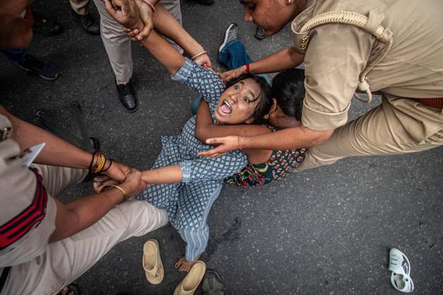 Protest to demand resignation of India s chief election commissioner in New Delhi NEW DELHI, INDIA - OCTOBER 11: Indian police officers detain a protestor during a mass protest organized by the Cockroach Janta Party (CJP) in New Delhi, India on October 11, 2026. Demonstrators gathered to demand the resignation of Chief Election Commissioner Gyanesh Kumar over alleged electoral roll irregularities and revisions. Yousuf Sarfaraz Anadolu New Delhi India. Editorial use only. Please get in touch for any other usage. Copyright: x2026xAnadoluxYousufxSarfarazx