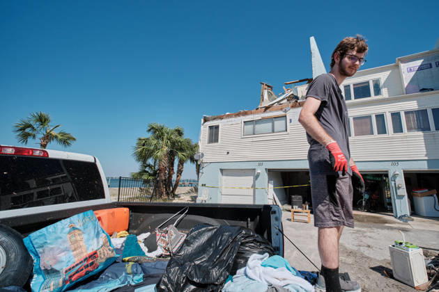 October 11, 2026, Pensacola Beach, Florida, U.S: October 11, 2026 Pensacola Beach, Florida USA: Alex Dean loads up the back of his truck with belonging from his storm damaged apartment complex after the arrival of Hurricane Isaias. Pensacola Beach U.S - ZUMAa14_ 20261011_zaf_a14_012 Copyright: xDanxAndersonx