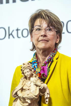 Construction Begins on the Pfaffensteig Tunnel in Stuttgart; Tunnel Patron Andrea Klett Eininger with a statue of Saint Barbara, patron saint of tunnel builders and miners. The 11-kilometer-long rail tunn