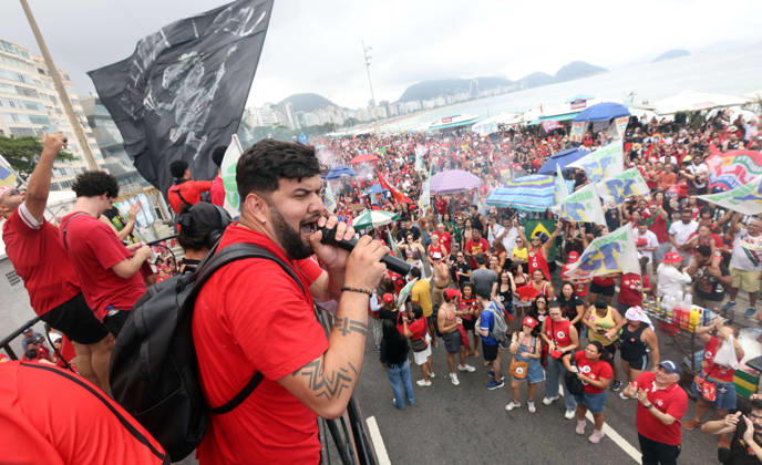 October 12, 2026, Rio De Janeiro, Rio De Janeiro, Brazil: Thousands of supporters gather in Copacabana, Rio de Janeiro, Brazil, on October 12, 2026, for a pro-democracy demonstration organized by the CENA Nacional movement, the National Union of Students (UNE) and Universibloco. Held on Brazilâ€⠢s Our Lady of Aparecida national holiday, the rally calls for the defense of constitutional rights and public policies supporting healthcare, education and social assistance. Carnival street bands, known as blocos, and percussion groups brought music and a festive atmosphere to the waterfront mobilization, blending political activism with Rioâ€⠢s popular street culture. The demonstration takes place ahead of Brazilâ€⠢s October 25 pres - ZUMAk251 20261012_znp_k251_001 Copyright: xBobxKarpx