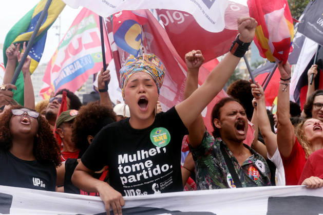 October 12, 2026, Rio De Janeiro, Rio De Janeiro, Brazil: Thousands of supporters gather in Copacabana, Rio de Janeiro, Brazil, on October 12, 2026, for a pro-democracy demonstration organized by the CENA Nacional movement, the National Union of Students (UNE) and Universibloco. Held on BrazilÃ¢â‚¬â ¢s Our Lady of Aparecida national holiday, the rally calls for the defense of constitutional rights and public policies supporting healthcare, education and social assistance. Carnival street bands, known as blocos, and percussion groups brought music and a festive atmosphere to the waterfront mobilization, blending political activism with RioÃ¢â‚¬â ¢s popular street culture. The demonstration takes place ahead of BrazilÃ¢â‚¬â ¢s October 25 pres - ZUMAk251 20261012_znp_k251_026 Copyright: xBobxKarpx