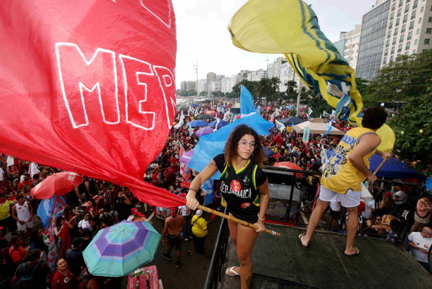 October 12, 2026, Rio De Janeiro, Rio De Janeiro, Brazil: Thousands of supporters gather in Copacabana, Rio de Janeiro, Brazil, on October 12, 2026, for a pro-democracy demonstration organized by the CENA Nacional movement, the National Union of Students (UNE) and Universibloco. Held on Brazilâ€⠢s Our Lady of Aparecida national holiday, the rally calls for the defense of constitutional rights and public policies supporting healthcare, education and social assistance. Carnival street bands, known as blocos, and percussion groups brought music and a festive atmosphere to the waterfront mobilization, blending political activism with Rioâ€⠢s popular street culture. The demonstration takes place ahead of Brazilâ€⠢s October 25 pres - ZUMAport 20261012_znp_k251_010 Copyright: xBobxKarpx