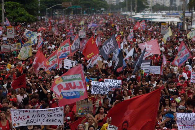 Supporters of Brazil s President Lula rally along Copacabana Beach RIO DE JANEIRO, BRAZIL - OCTOBER 12: Supporters of Brazilian President Luiz Inacio Lula da Silva gather along Avenida Atlantica at Copacabana Beach in Rio de Janeiro, Brazil, on October 12, 2026. The mass rally formed part of the Workers Party (PT) mobilization ahead of the high-stakes presidential runoff against Liberal Party (PL) candidate Senator Flavio Bolsonaro. Fabio Teixeira Anadolu Rio de Janeiro Brazil. Editorial use only. Please get in touch for any other usage.  Copyright: x2026xAnadoluxFabioxTeixeirax