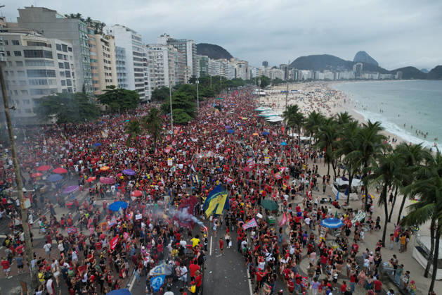 Supporters of Brazil s President Lula rally along Copacabana Beach RIO DE JANEIRO, BRAZIL - OCTOBER 12: Supporters of Brazilian President Luiz Inacio Lula da Silva gather along Avenida Atlantica at Copacabana Beach in Rio de Janeiro, Brazil, on October 12, 2026. The mass rally formed part of the Workers Party (PT) mobilization ahead of the high-stakes presidential runoff against Liberal Party (PL) candidate Senator Flavio Bolsonaro. Fabio Teixeira Anadolu Rio de Janeiro Brazil. Editorial use only. Please get in touch for any other usage.  Copyright: x2026xAnadoluxFabioxTeixeirax