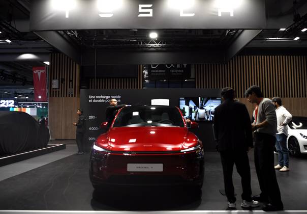 PARIS, FRANCE - OCTOBER 12: A general view shows the Tesla booth during the 2026 Paris Motor Show on October 12, 2026 in Paris, France. The Paris Motor Show, one of the world s largest auto exhibitions, opened its doors to showcase the latest innovations from global automakers.  Copyright: xChinaxNewsxServicex 111673824528