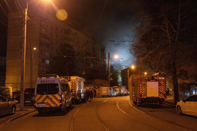 October 12, 2026, Kharkiv, Ukraine: KHARKIV, UKRAINE, OCTOBER 12, 2026: Emergency workers conduct rescue operations at a residential building damaged in a Russian strike in Kharkiv s Kholodnohirskyi district. A firefighter was injured by falling concrete debris while clearing the rubble and was evacuated on a stretcher. Kharkiv Ukraine - ZUMAq101 20261012_zna_q101_138 Copyright: xAndrewxClingx