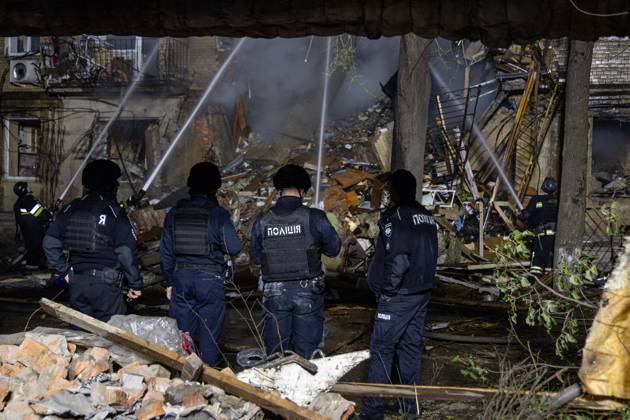 October 13, 2026, Kharkiv, Ukraine: KHARKIV, UKRAINE, OCTOBER 12, 2026: Emergency workers conduct rescue operations at a residential building damaged in a Russian strike in Kharkiv s Kholodnohirskyi district. A firefighter was injured by falling concrete debris while clearing the rubble and was evacuated on a stretcher. Kharkiv Ukraine  - ZUMAq101 20261013_zna_q101_004 Copyright: xAndrewxClingx