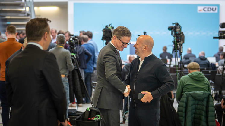 Federal Health Minister Carsten Linnemann (CDU), along with ZDF journalist and Federal Press Conference Chairman Mathis Feldhoff (from left), warmly greet one another at the CDU Federal Headquarters during the CDU of Germany’s Executive Committee Retreat in Berlin, October 2026, Berlin, Germany, Konrad Adenauer House