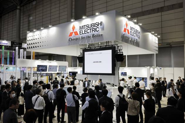 CEATEC electronics show People visit the Combined Exhibition of Advanced Technologies electronics show, known as CEATEC, at the Makuhari Messe convention center in the eastern Japan city of Chiba on Oct. 13, 2026, the opening day of the four-day event.  A14AA0005630737P