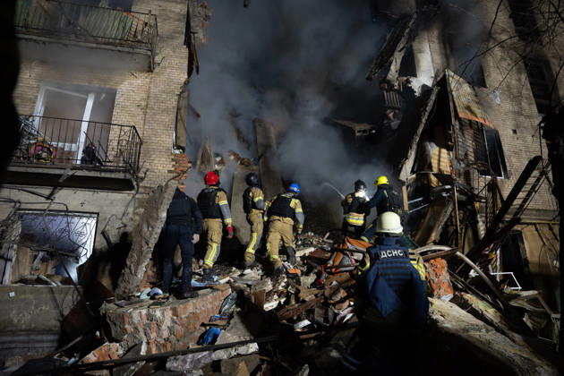 October 12, 2026, Kharkiv, Kharkiv Oblast, Ukraine: Local rescue workers and volunteers clear rubble following a Russian Missile attack on a residential area that killed multiple people in Kharkiv, Ukraine. Emergency crews search through the heavily damaged building and collapsed sections of the building for survivors and the remains of those killed in the attack. Kharkiv Ukraine - ZUMAm350 20261012_zip_m350_013 Copyright: xCameronxJones-Manleyx