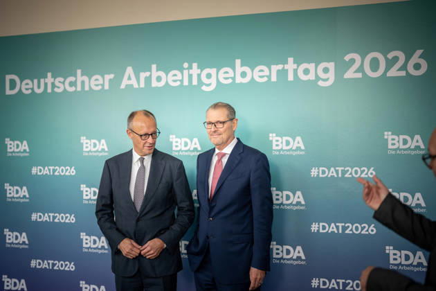 Chancellor Friedrich Merz is welcomed by Rainer Dulger, President of the Confederation of German Employers Associations (BDA), at the start of the 2026 German Employers Day, hosted by the Confederation of German Employers Associations (BDA), Berlin, Germany, at the Berlin Congress Center (bcc)