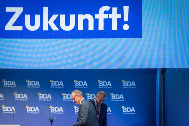 Chancellor Friedrich Merz is welcomed by Rainer Dulger, President of the Confederation of German Employers Associations (BDA), at the start of the 2026 German Employers Day, hosted by the Confederation of German Employers Associations (BDA), Berlin, Germany, at the Berlin Congress Center (bcc)