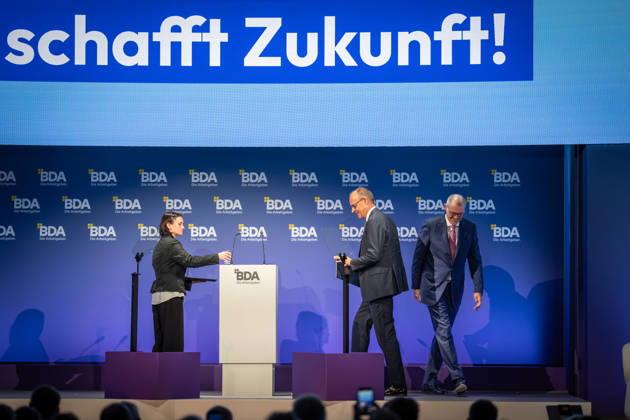 Chancellor Friedrich Merz is welcomed by Rainer Dulger, President of the Confederation of German Employers Associations (BDA), at the start of the 2026 German Employers Day, hosted by the Confederation of German Employers Associations (BDA), Berlin, Germany, at the Berlin Congress Center (bcc)