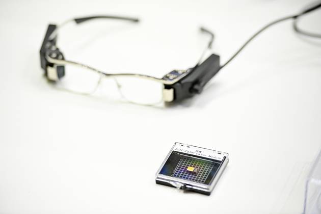 Japan showcases emerging technologies at CEATEC 2026 CHIBA, JAPAN - OCTOBER 13: A prototype of smart glasses incorporating TDK s Meta-Optic Mirror technology is displayed during CEATEC 2026 at Makuhari Messe in Chiba, Japan, October 13, 2026. The 150-nanometer-thick optical mirror is designed to replace bulkier curved mirrors traditionally used in direct retinal projection systems. David Mareuil Anadolu Chiba Japan. Editorial use only. Please get in touch for any other usage.  Copyright: x2026xAnadoluxDavidxMareuilx