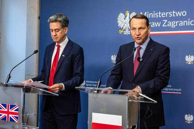 October 13, 2026, Warsaw, Mazovia, Poland: Poland s Minister of Foreign Affairs, Radoslaw Sikorski, speaks during the press conference..Foreign Secretary of the United Kingdom of Great Britain and Northern Ireland visits the Ministry of Foreign Affairs in Warsaw, Poland for a meeting with the Republic of Poland s Foreign Minister, Radoslaw Sikorski. During the subsequent press conference, the ministers discussed their countries ongoing cooperation in foreign policy issues, including supporting Ukraine in the war Russia is waging against it. Miliband also spoke of the ties his family has to Poland. Afterwards, the ministers travel to the second day of the Warsaw Security Forum. Warsaw Poland - ZUMAs197 20261013_aaa_s197_017 Copyright: xNeilxMiltonx