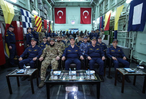 NUSRET-2026 Invitational Exercise continues in Turkiye s Izmir IZMIR, TURKIYE - OCTOBER 13: Turkish Naval Forces Commander Admiral Ercument Tatlioglu (C) and Syrian Naval Forces Commander Brigadier General Mohammed al-Saud (2nd L) follow activities aboard TCG Salihreis, the flagship of the NUSRET-2026 Invitation Exercise, during Distinguished Observer Day activities off the coast of Foca, Izmir, Turkiye, on October 13, 2026. Hosted by Turkiye and conducted by the Turkish Naval Forces Mine Fleet Command, the exercise involves naval and air assets from NATO and Turkiye, as well as the Turkish Coast Guard, with observers from various countries. Mahmut Serdar Alakus Anadolu Izmir Turkey. Editorial use only. Please get in touch for any other Copyright: x2026xAnadoluxMahmutxSerdarxAlakusx