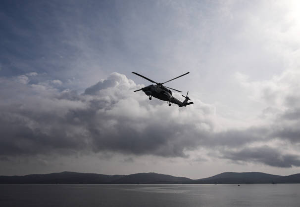 NUSRET-2026 Invitational Exercise continues in Turkiye s Izmir IZMIR, TURKIYE - OCTOBER 13: A military helicopter flies during Distinguished Observer Day activities held off the coast of Foca district in Izmir, Turkiye, on October 13, 2026, as part of the NUSRET-2026 Invitational Exercise. Hosted by Turkiye and conducted by the Turkish Naval Forces Mine Fleet Command, the exercise continues in the Gulf of Izmir and off Karadeniz Eregli, with the participation of naval, air and coast guard assets from NATO and Turkiye, along with observers from various countries. Mahmut Serdar Alakus Anadolu Izmir Turkey. Editorial use only. Please get in touch for any other usage.  Copyright: x2026xAnadoluxMahmutxSerdarxAlakusx