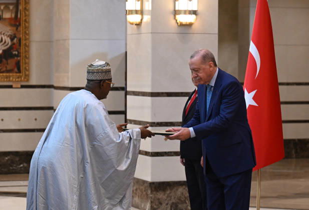 Turkish President Recep Tayyip Erdogan ANKARA, TURKIYE - OCTOBER 13: Nigerian Ambassador to Turkiye, Saidu Usman Nasamu Dakingari (L) presents his letters of credence to Turkish President Recep Tayyip Erdogan (R), as Erdogan receives the ambassadors of India, Mali, Netherlands, El Salvador and Nigeria at the Presidential Complex, in Ankara, Turkiye on October 13, 2026. Mehmet Ali Ozcan Anadolu Ankara Turkey. Editorial use only. Please get in touch for any other usage.  Copyright: x2026xAnadoluxMehmetxAlixOzcanx