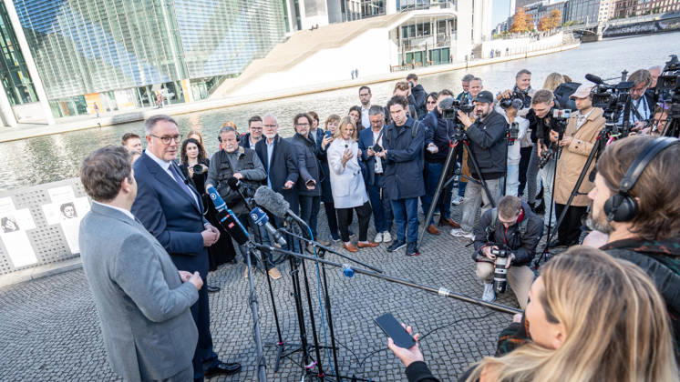 Lars Klingbeil, SPD Party Chairman and Federal Minister of Finance, and Alexander Schweitzer, Federal Minister of Labor-designate, at Friedrich-Ebert-Platz in front of the Bundestag building; introduction of the new Federal Minister of Labor on the day of his swearing-in by the SPD Party Chairman, Berlin, Berlin, Germany, Friedrich-Ebert-Platz