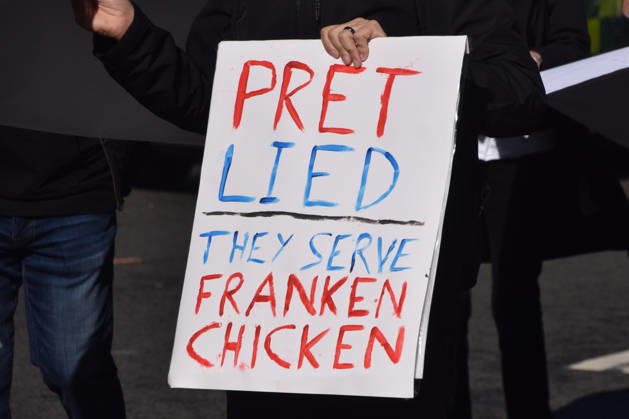 October 13, 2026, London, England, United Kingdom: Protesters pass through Parliament Square during the march to Pret headquarters urging the fast food chain to drop Frankenchickens. Frankenchickens are chickens mostly raised on factory farms who are bred to grow much faster and who are said to suffer far more than regular chickens. London United Kingdom - ZUMAv130 20261013_zip_v130_038 Copyright: xVukxValcicx
