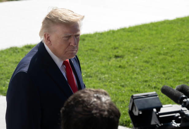 October 13, 2026, Washington, District Of Columbia, USA: United States President Donald J Trump speaks to reporters prior to departing for a campaign trip to Alaska, Nevada, Arizona and Montana from the South Lawn of the White House in Washington, DC, USA, on Tuesday, October 13, 2026 Washington USA  - ZUMAs152 20261013_faa_s152_036 Copyright: xRonxSachs-CNPx