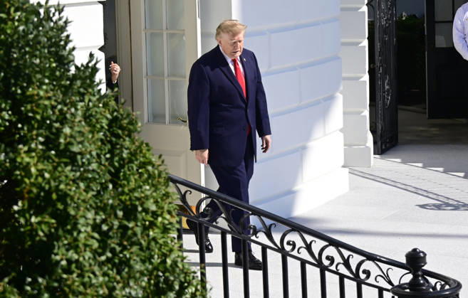 October 13, 2026, Washington, District Of Columbia, USA: United States President Donald J Trump emerges from the Diplomatic Entrance as he departs for a campaign trip to Alaska, Nevada, Arizona and Montana from the South Lawn of the White House in Washington, DC, USA, on Tuesday, October 13, 2026 Washington USA  - ZUMAs152 20261013_faa_s152_040 Copyright: xRonxSachs-CNPx