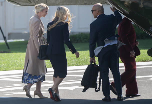 October 13, 2026, Washington, District Of Columbia, USA: Natalie Harp, Executive Assistant to the President, White House Press Secretary Katie Zacharia, and Walt Nauta, Director of White House Oval Office Operations, board Marine One to accompany United States President Donald J Trump as he departs for a campaign trip to Alaska, Nevada, Arizona and Montana from the South Lawn of the White House in Washington, DC, USA, on Tuesday, October 13, 2026 Washington USA - ZUMAs152 20261013_faa_s152_038 Copyright: xRonxSachs-CNPx
