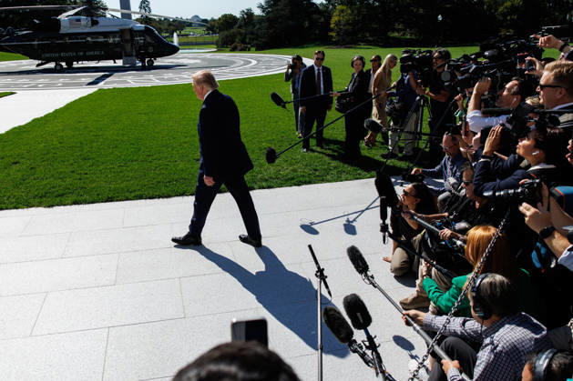 DC: President Trump Departs the White House President Donald Trump walks towards Marine One after speaking to members of the media before departing from the South Lawn of the White House on October 13, 2026 in Washington, D.C. Trump is heading to Wasilla, Alaska for a midterm campaign rally in support of Senator Dan Sullivan and Representative Nick Begich before heading to Las Vegas, Nevada where he will spend the night. (Photo by Samuel Corum Pool ABACAPRESS.COM) Washington DC United States  Copyright: xPool ABACAx