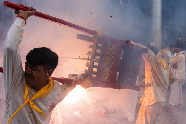 October 13, 2026, Trang, Thailand: Devotees set off firecrackers during a street procession in the Vegetarian Festival..The annual Vegetarian Festival is held in Bangkok and many parts of southern Thailand, including Trang, Phatthalung, and Phuket, where worshippers refrain from eating animal products over the nine days, coinciding with the celebration of the Nine Emperor Gods. Trang Thailand - ZUMAs197 20261013_aaa_s197_189 Copyright: xPeeraponxBoonyakiatx