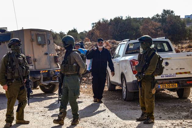 October 13, 2026, Ramallah: TURMUSAYA, WEST BANK, PALESTINE, OCTOBER 13, 2026: Palestinian residents and farmers are prevented by Israeli settlers and forces from reaching their agricultural land to harvest olives in Turmusaya, northeast of Ramallah, in the occupied West Bank. The restrictions disrupt the annual olive harvest, an important source of income for local farming families. Ramallah - ZUMAq101 20261013_zna_q101_226 Copyright: xSalmanxMohsenxAlkhatibx