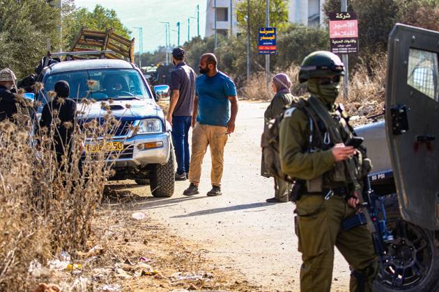 October 13, 2026, Ramallah: TURMUSAYA, WEST BANK, PALESTINE, OCTOBER 13, 2026: Palestinian residents and farmers are prevented by Israeli settlers and forces from reaching their agricultural land to harvest olives in Turmusaya, northeast of Ramallah, in the occupied West Bank. The restrictions disrupt the annual olive harvest, an important source of income for local farming families. Ramallah - ZUMAq101 20261013_zna_q101_228 Copyright: xSalmanxMohsenxAlkhatibx