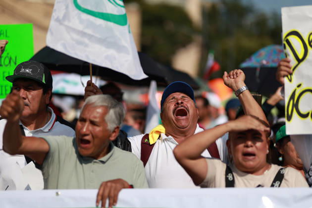 Thousands of healthcare workers hold national protest in Mexico City MEXICO CITY, MEXICO - OCTOBER 13: People take part in a national protest march demanding wage increases for healthcare workers and more medical supplies for Mexico s public health system, in Mexico City, Mexico on October 13, 2026. Thousands of members of the Mexican Social Security Institute (IMSS) marched to demand higher wages, improved working conditions, and action to address nationwide shortages of basic medicines and supplies across public hospitals. Daniel Cardenas Anadolu Mexico City Mexico. Editorial use only. Please get in touch for any other usage.  Copyright: x2026xAnadoluxDanielxCardenasx