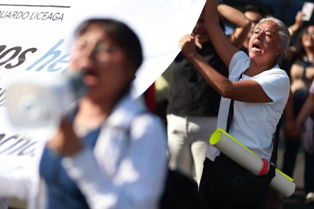 Thousands of healthcare workers hold national protest in Mexico City MEXICO CITY, MEXICO - OCTOBER 13: People take part in a national protest march demanding wage increases for healthcare workers and more medical supplies for Mexico s public health system, in Mexico City, Mexico on October 13, 2026. Thousands of members of the Mexican Social Security Institute (IMSS) marched to demand higher wages, improved working conditions, and action to address nationwide shortages of basic medicines and supplies across public hospitals. Daniel Cardenas Anadolu Mexico City Mexico. Editorial use only. Please get in touch for any other usage.  Copyright: x2026xAnadoluxDanielxCardenasx